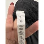 Lululemon Hotty Hot High-Rise Skirt Black Size 8 Liner Athletic Reflective Logo Photo 3