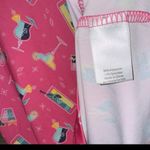 Coral Bay - NWT- women’s golf shirt- Large- pink with cocktail print Photo 2