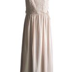 Christina Wu NWT--TWO PIECE TAUPE FORMAL SET-SIZE 10 Stunning lace sleeveless top, fully lined, buttons down the back, long flowy skirt, fully lined, back zip, a beautiful two piece set, perfect for wedding, prom, any formal occasion, brand new with tags. Measurements: Top: Bust: armpit to armpit 20 inches  Length: shoulder seam to bottom 17 inches  Skirt: Waist: side to side 15 inches  Length: waistband to bottom 45 inches Photo 0