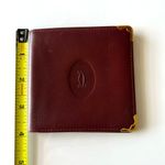 Cartier Authentic  Burgundy Leather Wallet with Gold Accents Photo 7