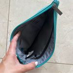 Open Story Like New Teal Leather Like Wristlet Cosmetic Case Photo 1