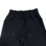 Lululemon  On The Fly Jogger Size 2 Black Athletic Pants 29” Travel Woven W5BZDS Photo 7