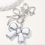 Silver Bow Dangle Earrings Double Ribbon Statement Coquette Chic NWT Photo 1