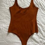Shinestar Orange bodysuit Photo 1