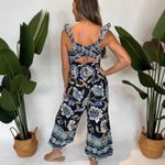 Free People Bali Albright Smocked Cut Out Wide Leg Jumpsuit in Navy Combo Photo 12
