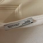 ZARA NEW Asymmetrical Hem Slouchy White Crewneck Blouse Small Soft Stretch EUC Photo 1