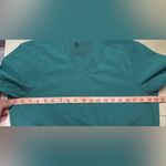 FIGS  Environmentally Awesome Collection Size Medium Green Scrub Top Photo 3