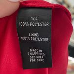 B. Wear  Red Ruffle Blouse Photo 6