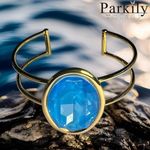 A Gold Handcrafted bracelet with large oval blue Swarovski crystal Photo 1