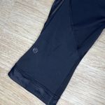 Lululemon  Black Chase Me Crop 2 Leggings Sz 6 Low Rise Stretch Athleisure Glossy Photo 5