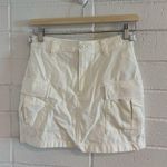 Aritzia TNA cargo style mini skirt in white Photo 0
