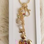 Disney Gold Keychain with Colorful Charms Photo 0