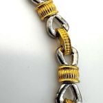 silver and gold tone bow necklace Photo 4