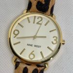 Nine West  gold tone women watch 40mm quartz analog leopard print running Photo 2