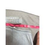 We Wore What Revolve  Medium Cutouts Belted Mini Skirt Blue Light Wash Stretch NWT Photo 6