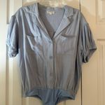 Vestique Light Blue Button Body Suit Photo 0