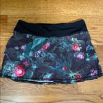 Lululemon Black and Floral Pleated Tennis Skort Photo 0