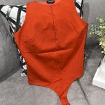Bebe Orange bodysuit size L Photo 0