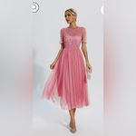 Elegant Pink Midi Dress with Star Accents Photo 1