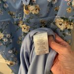 Almost Famous blue body fitting ruched floral strappy dress. Photo 3