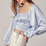 JET SET LONG SLEEVE RUCHED CROP TOP Size undefined Photo 1