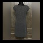 Karin Stevens Little black sleeveless dress. PM Photo 1