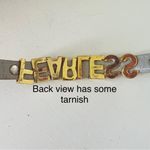BCBGeneration Gray Leather with Gold "Fearless" Text on snap Bracelet Photo 6