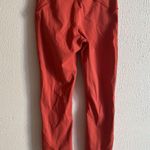 Lululemon  leggings Salmon orange with floral detailing Sz 4 Photo 2