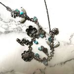 Silver tone blue faux pearl flower charm necklace Photo 9