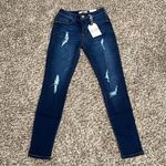 California vintage Dark Wash Mid Rise Distressed Skinny Jeans Photo 1
