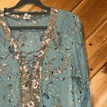 Gimmicks by BKE Gimmicks green lace up front blouse with bird butterfly floral pattern Photo 1