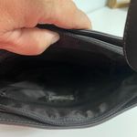 The Sak  soft knit multi colored striped crossbody purse.  Has a 70s/80s vibe Photo 2