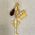 Mud Pie Gold Tone Charm Necklace Crown Key Fleur-de-Lis Purple Crystal Photo 0