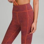 Lululemon Invigorate HR Tight 25” in Orange Pattern Photo 1