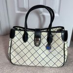 Dooney & Bourke Black and Cream Logo Satchel with blue duck bag charm Photo 0