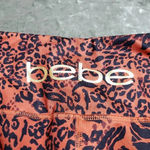 Bebe  Leopard Print Biker Shorts Photo 3