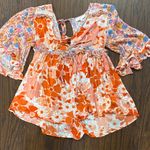 Floral Orange Women's romper Size L Photo 0