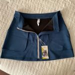 Halara  Mid Rise Front Zip Side Pocket Plain Mini Skirt Deep Prussian Blue Size M Photo 3