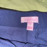 Lilly Pulitzer  Madison Skort in Textured Navy color with gold-button details. Photo 1