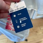 Tommy Bahama  active SPF50 white zip front short sleeve shirt Photo 5