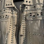 Akira  Tan Jean Fabric with Silver and Black Accent Studs embellished all over. Photo 1