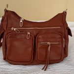 Brown Leather Shoulder Bag with Slouchy Design and Gold Hardware Photo 0