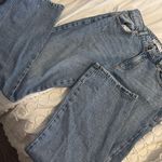 Garage   high-waisted pants with a cute ripped detail. Worn only once! Very good quality and such a nice color. Photo 0