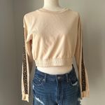 Kittenish  cropped long sleeve top Photo 1