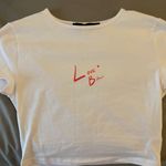 LIONESS Baby Tee Photo 1