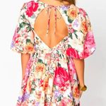 Boutique floral dress. So cute but a little big on me! Multi Photo 1