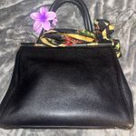 Coach Elegant Black Handbag with Floral Scarf Accent Photo 1