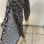 Lulu’s floral jumpsuit with slit sides size small Black Photo 2