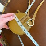 Rebecca Minkoff  Barrel crossbody Bag in Nutmeg with wristlet strap quiet Luxury Photo 11