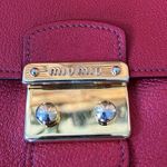 Miu Miu Sound Lock Leather Crossbody in red with gold hardware Photo 1